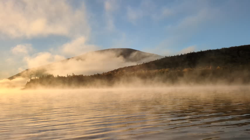 Sunrise on the Nictau Lake at the autumn fall colorful in the Mount Carleton Provincial Park (Saint-Quentin, New Brunswick, Canada)