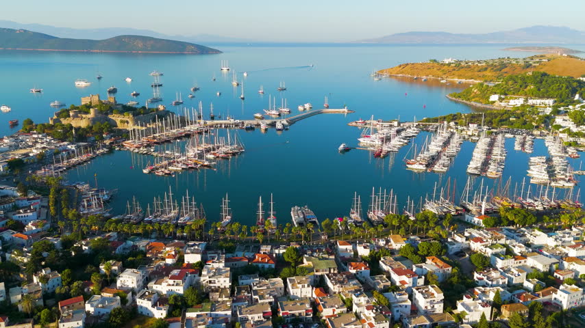 Bodrum, Turkey. Bodrum Castle, a 15th-century stone fortress built by the Knights of St. John, occupies a rocky peninsula between two sheltered bays. The castle