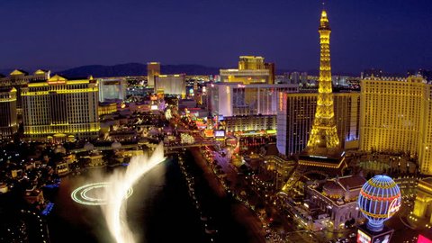 Illuminated view Paris hotel Eiffel Tower nr Bellagio fountains, Las Vegas Strip, USA