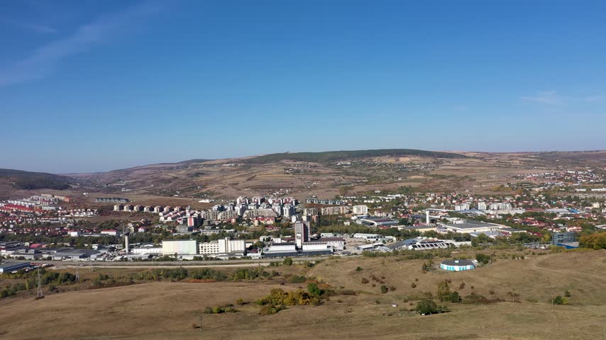 Drone perspective of Cluj-Napoca city suburbs and industrial district in Romania 