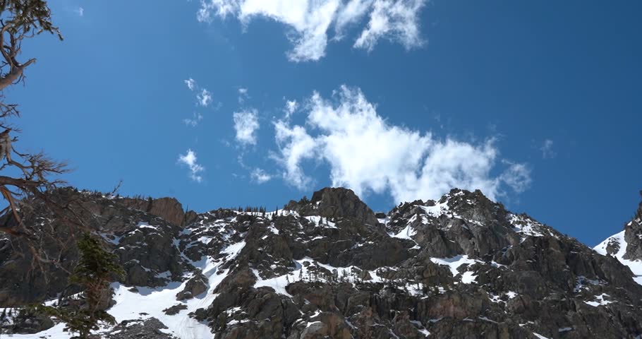 Clouds moving over mountain ridge in Rocky Mountain National Park, Colorado