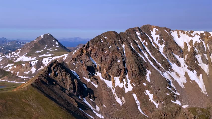 Landscape view of Missouri Mountain Spring Rocky Mountains Collegiate Peaks from Mt Belford Oxford Colorado Missouri Gulch trail Elkhead Pass Sawatch Range alpine tundra snow morning blue sky sunny