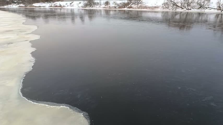 Thin spring ice on the river