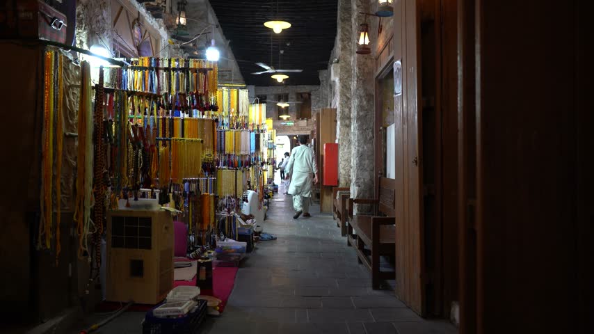 Traditional arab market alleyway selling goods in souq waqif