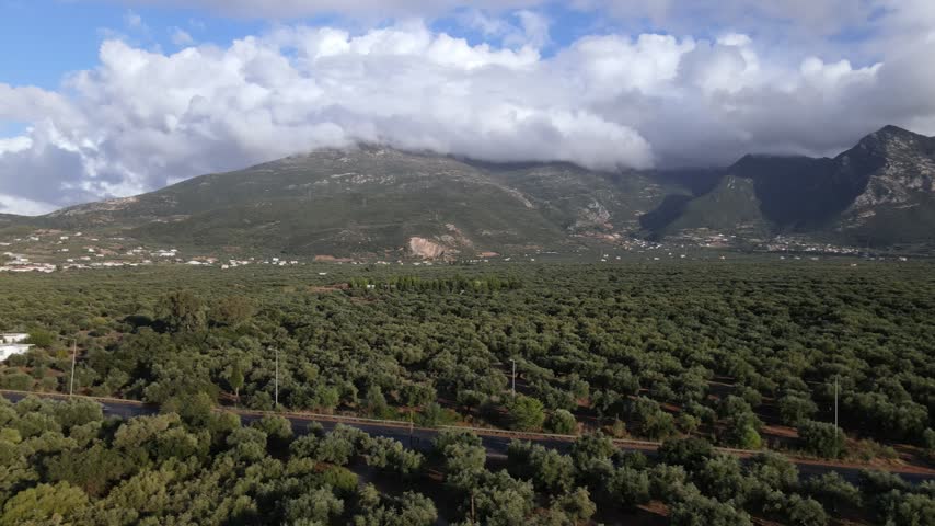 Aerial footage mountains with clouds after the rain