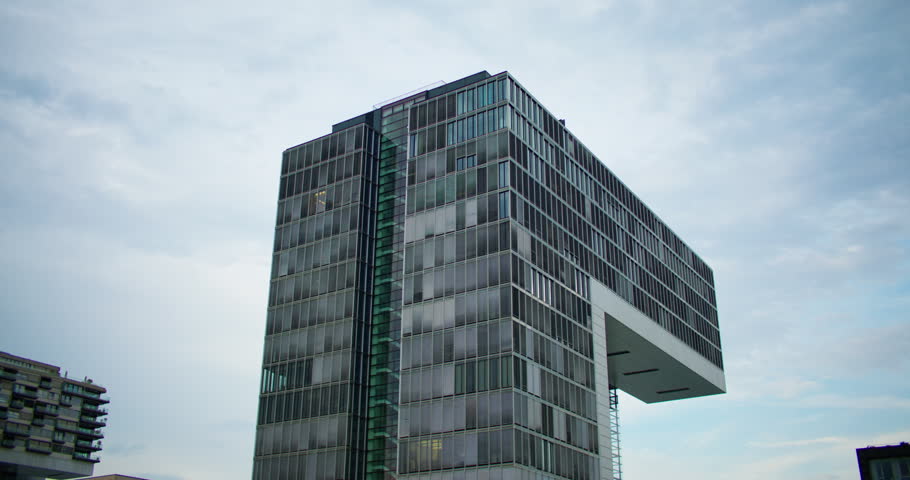 Contemporary Kranhaus buildings on the Cologne waterfront overlooking the Rhine River with impressive modern architecture and scenic European city landscape
