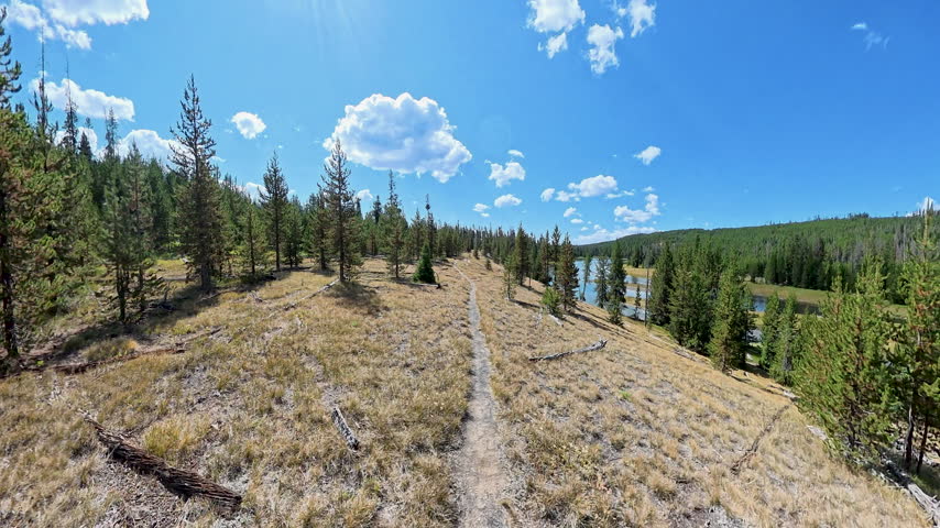 Hiking on Trail with Views of Lewis River in Yellowstone National Park