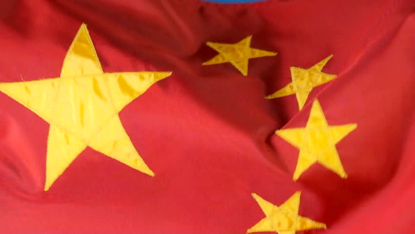 Close up of Chinese flag waving in the breeze