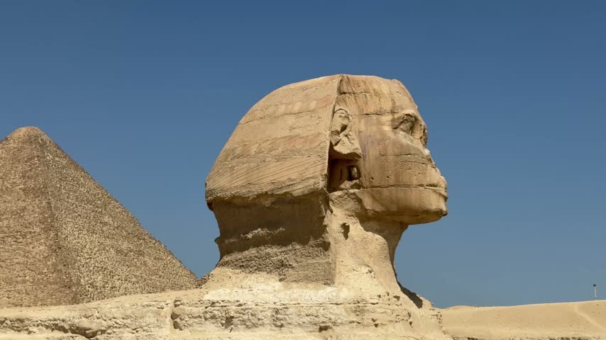 Great Sphinx of Giza With Pyramid Behind on the Giza Plateau Egypt