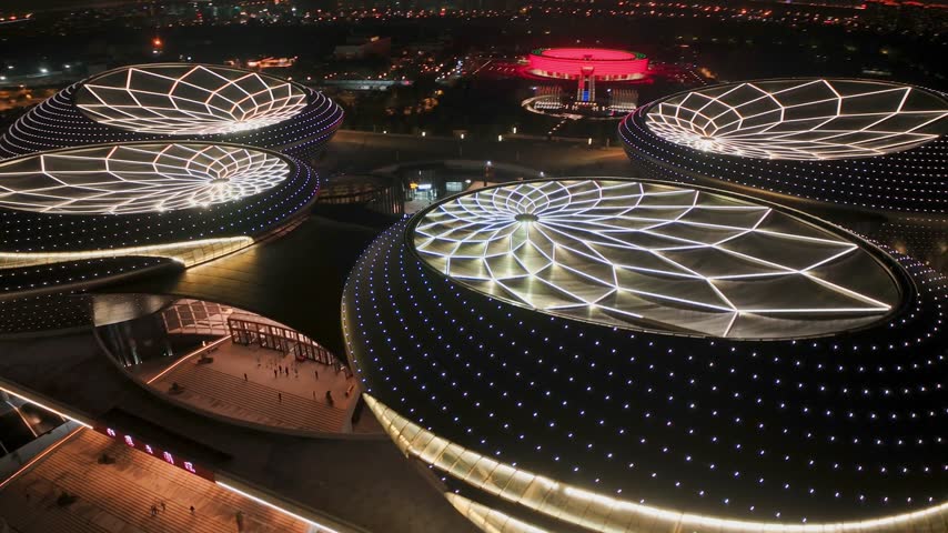 Aerial footage of Nanjing, China, captured in stunning 4K. From the iconic Zifeng Tower piercing the skyline to the serene waters of Xuanwu Lake, this collection showcases the harmonious blend of ancient heritage and modern development. Discover the Ming City Wall, Jiming Temple, and the winding Qinhuai River alongside gleaming skyscrapers and lush green parks. Perfect for travel documentaries, city promotional videos, cultural projects, and establishing shots. 