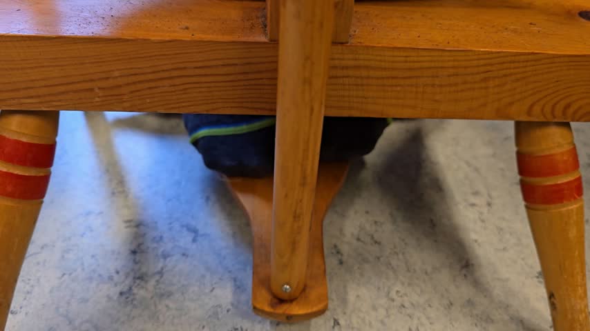  Close Up of a Socked Foot Operating the Wooden Treadle of a Spinning Wheel.
Norway, Alver. Oktober