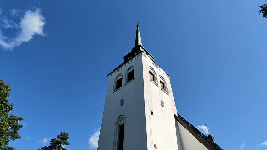 Valkeala Church Interior in Finland with Painted Blue Ceiling, Golden Chandeliers and Historic Altar