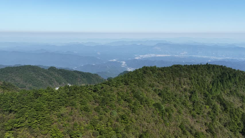 Panoramic view of lake and buildings in mountains