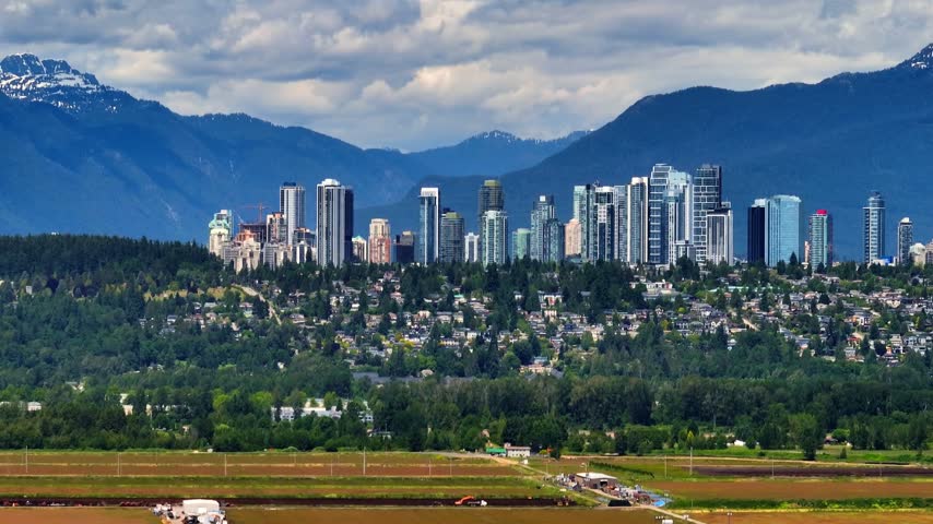 Metrotown area of Burnaby, British Columbia, Canada, showing high-rise buildings, urban streets and the surrounding cityscape