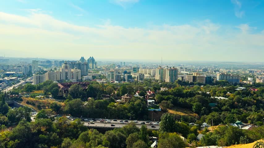 High-rise Cityscape With Floral And Lavender Terraced Slope At Kok Tobe Park In Almaty, Kazakhstan. Panning Shot