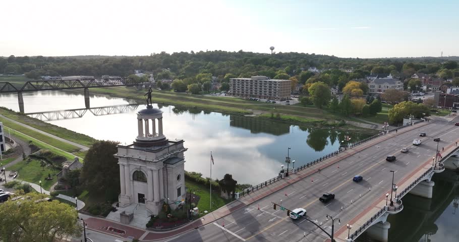 Aerial view of the Soldiers, Sailors and Pioneers Monument near the Great Miami River and a bridge with traffic in Hamilton, Ohio, United States.