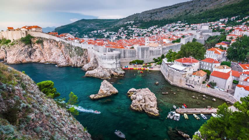 Discover the breathtaking beauty of Dubrovnik, Croatia, with its historic red-roofed buildings, ancient stone walls, and stunning Adriatic Sea views. A timeless coastal destination rich in history and Mediterranean charm.