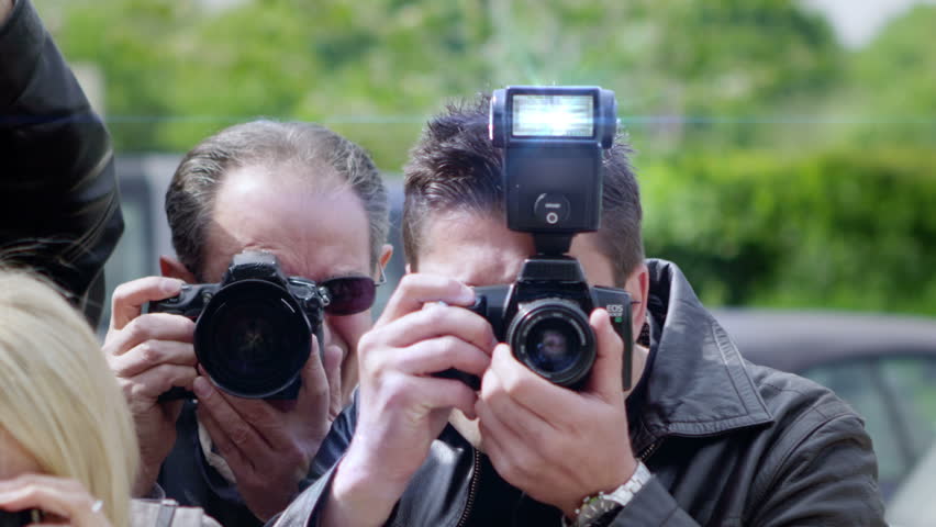 Celebrity Being Photographed By a Large Group of Paparazzi Royalty-Free Stock Footage #4208857