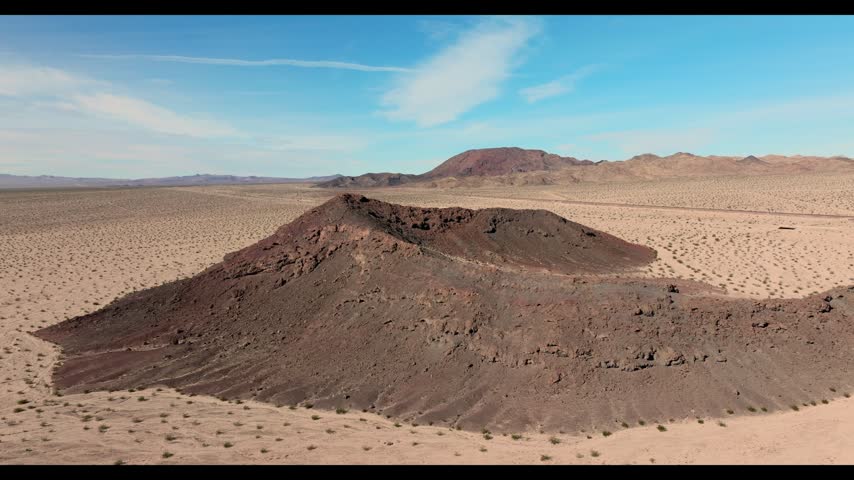 Aerial view of Amboy Crater cinder cone and lava field in the Mojave Desert