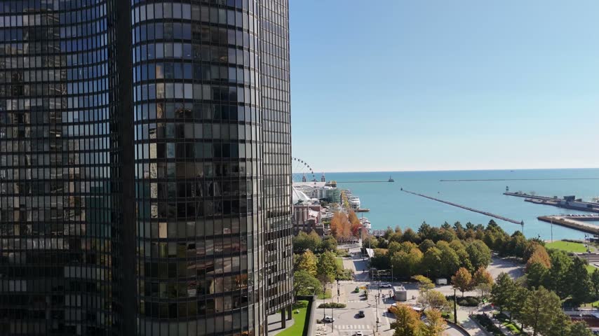 Aerial view of Chicago lakefront harbor and Lake Michigan shoreline. Filmed in Chicago, Illinois.