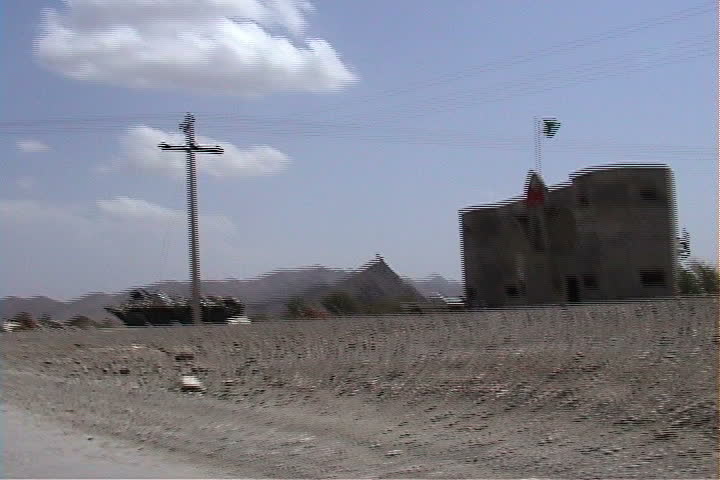 Camouflaged tank in front of archway in Makeen area in South waziristan, Pakistan.