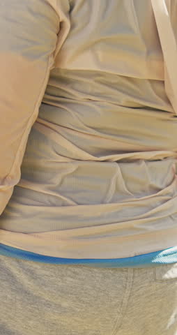 Elderly, person and hands for back pain in park for muscle tension, bad posture or overworked strain. Senior, fitness or discomfort with sore spine or ache for pressure, fibromyalgia or injury