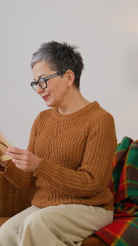 Senior woman looking at a photo frame with nostalgia