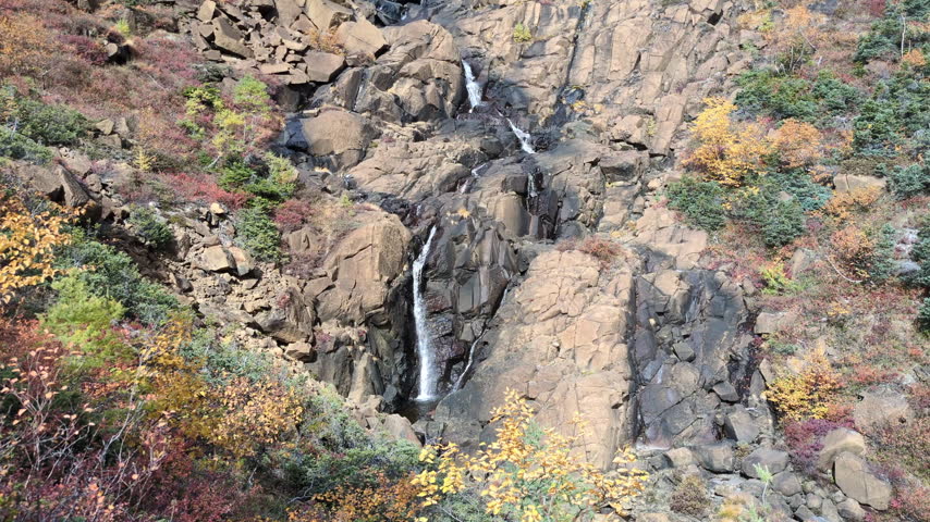 Waterfall on the Devil’s creek falling from the summit of the Albert Mount seen from the Mont Albert loop trail in Gaspésie National Park (Québec, Canada)