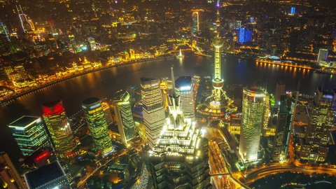 China Shanghai, time lapse(move up). 
Aerial view of high-rise buildings with Huangpu River in Shanghai, China. Jin Mao Tower ( (one of China's tallest buildings) and Oriental Pearl Tower. Stock Video
