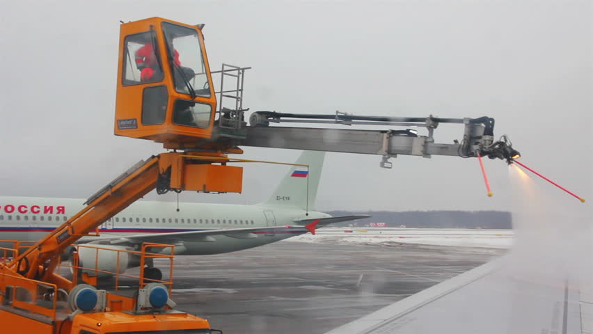 MOSCOW, RUSSIA - FEBRUARY 10, 2013: Processing aircraft anti-icing in airport in