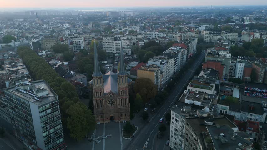 Drone view Russian Orthodox Church with twin spires on Antwerp city skyline, Belgium