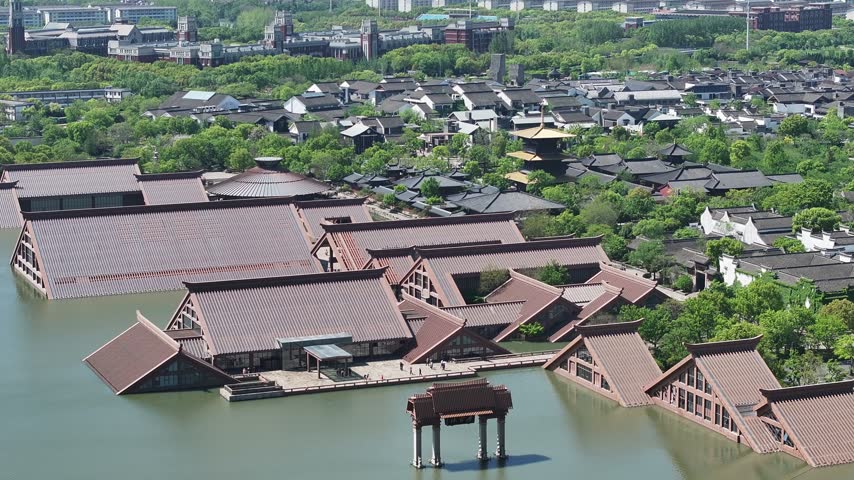 Aerial View of a Waterfront Pavilion and Submerged Roofs at Guangfulin