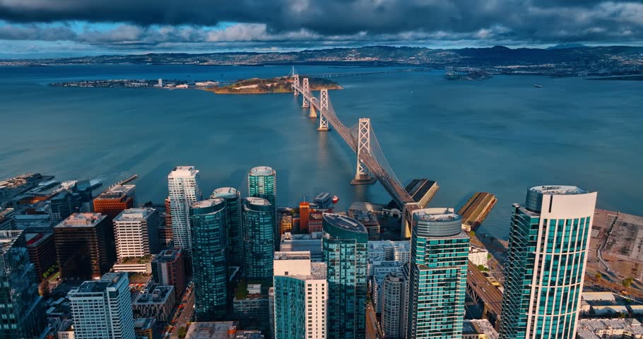 Dramatic cloudscape accumulated in the sky over San Francisco Bay. Moving over the high-rises of downtown San Francisco, California, USA on cloudy day.