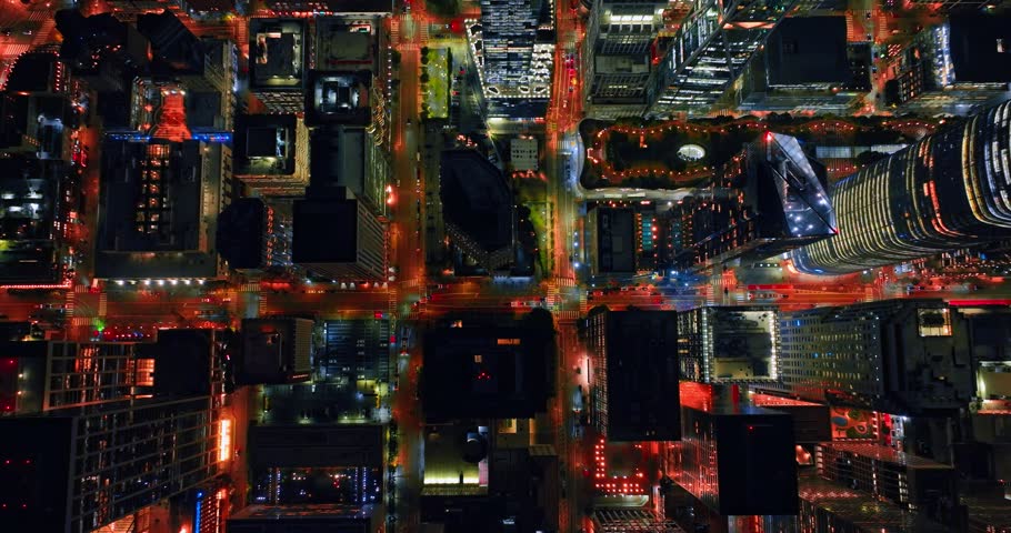 Beautiful well-lit streets of modern lively San Francisco, California, USA. Night footage over the neighborhoods of the city with vibrant nightlife.