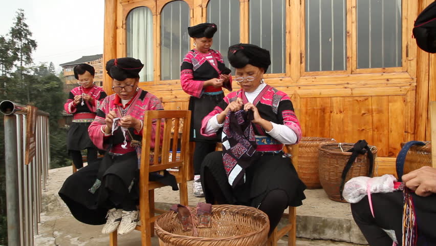 LONGSHENG, GUANGXI, CHINA - OCTOBER 22: Yao ethnic minority women embroidering