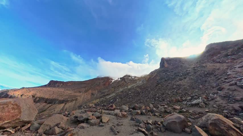 Alpinists walking the rocky trail on the iztaccihuatl volcano towards the otis mcallister shelter