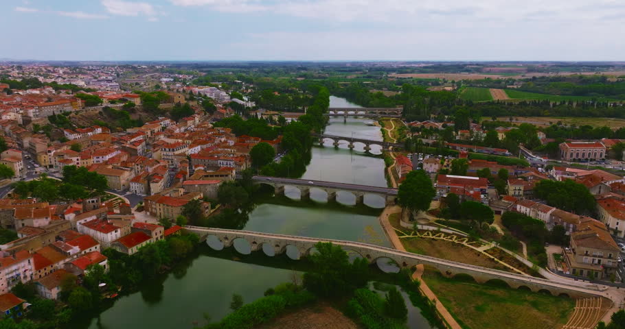 Aerial view of Beziers, charming historic city in southern France, known for the Cathedral of Saint Nazaire, the Canal du Midi, picturesque streets, traditional French architecture