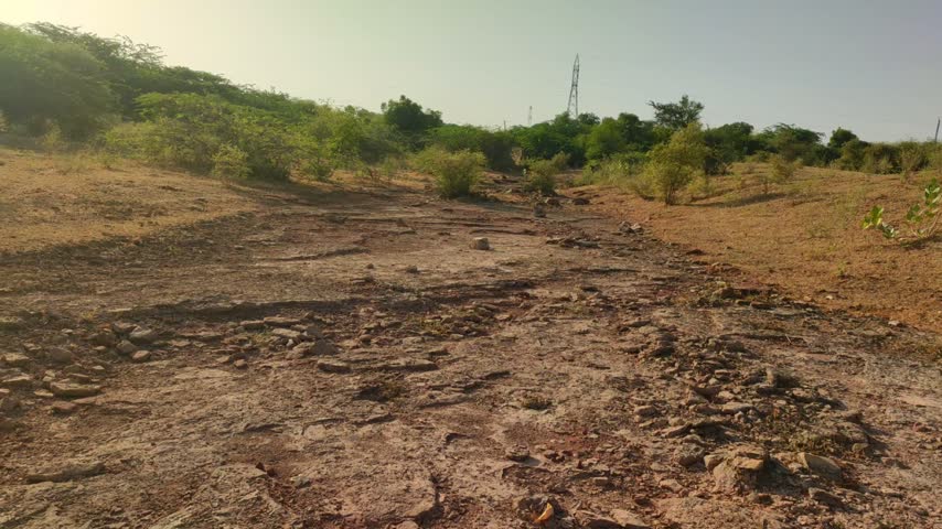 Dried river in the forest with rocky landscape