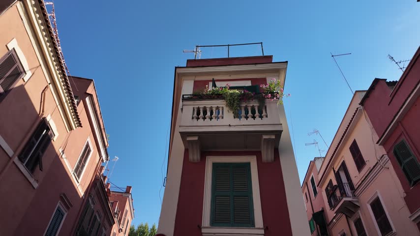 Entrance to a narrow colorful Italian street in a historic town