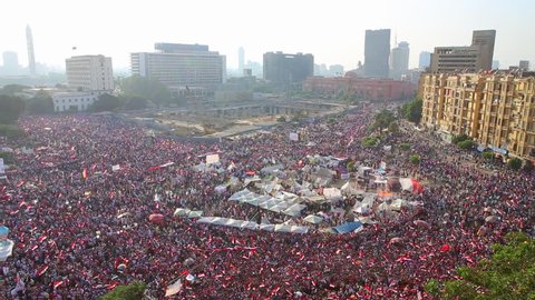 CAIRO, EGYPT - 2013: Crowds gather in Tahrir Square in Cairo, Egypt.