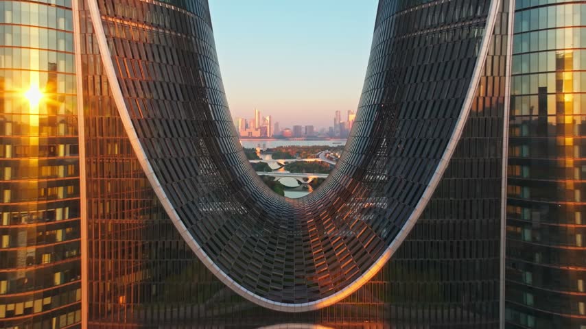 Hangzhou, China – 4K Aerial Collection: Soar above one of China’s most poetic cities, where ancient pagodas rise from misty lakes and futuristic skylines glow along the Qiantang River. This 42-clip collection captures West Lake’s UNESCO landscapes, Leifeng Pagoda at sunrise, the glass towers of Qianjiang New Town, tranquil Xixi Wetland, and emerald Longjing tea terraces. Every shot is stabilized 4K drone footage, graded for cinematic clarity—ready for travel films, documentaries, city branding, and broadcast use. A rare aerial portrait of Hangzhou’s past and future in one frame.