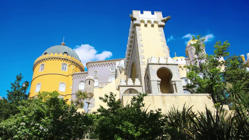 National Palace of Pena near Sintra, Portugal
The Pena National Palace was one of the main residences of the Portuguese royal family during the 19th century, located in Sintra, near Lisbon, PortugaPalace of Pena in Sintra. Lisbon, Portugal. Part of cultural site of Sintra City. Drone Point of View. 4k.