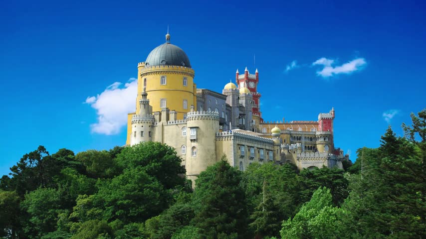 National Palace of Pena near Sintra, Portugal
The Pena National Palace was one of the main residences of the Portuguese royal family during the 19th century, located in Sintra, near Lisbon, PortugaPalace of Pena in Sintra. Lisbon, Portugal. Part of cultural site of Sintra City. Drone Point of View. 4k.