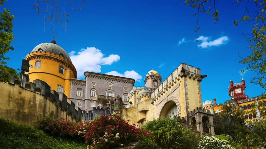 National Palace of Pena near Sintra, Portugal
The Pena National Palace was one of the main residences of the Portuguese royal family during the 19th century, located in Sintra, near Lisbon, PortugaPalace of Pena in Sintra. Lisbon, Portugal. Part of cultural site of Sintra City. Drone Point of View. 4k.