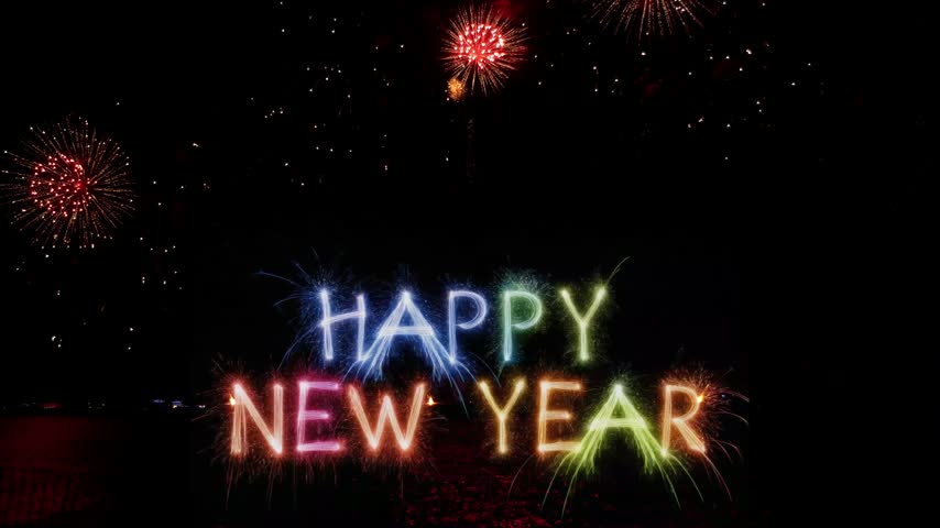 Amazing beautiful colorful firework display over sea on celebration night. Fireworks show for happy new year, 4k footage.