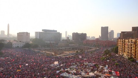 CAIRO, EGYPT - 2013: Crowds gather in Tahrir Square in Cairo, Egypt.