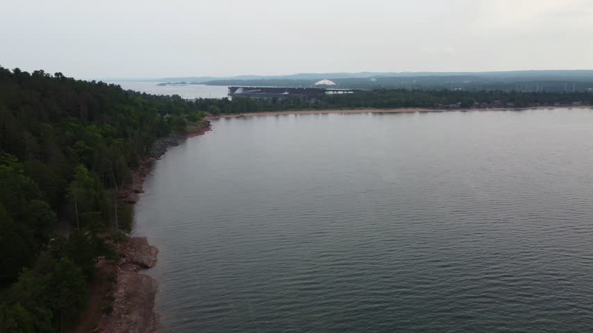 Slow approach Aerial just outside Presque Isle Park in Marquette Michigan. Beautiful landscape on the shores of Lake Superior.