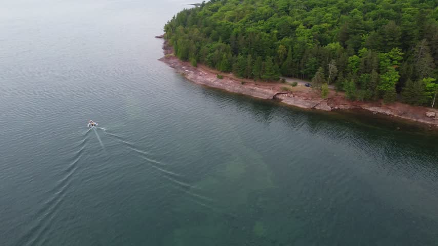 Dynamic Turning Aerial just outside Presque Isle Park in Marquette Michigan. Beautiful landscape on the shores of Lake Superior.