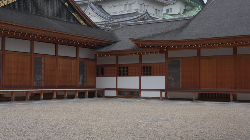 Traditional wooden buildings of Honmaru Palace and Main keep at Nagoya Castle Japan