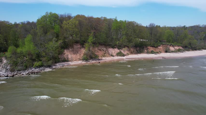
Approach Beach and Rise Aerial of Silver Creek Park in Manitowoc Wisconsin on the Shore of Lake Michigan